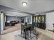 Open concept living space featuring dining area connected to living room at 5660 Elsinore Way, Lakeland, FL 33805