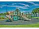 Enjoy the community playground with swings and slides, providing endless fun for children at 5660 Elsinore Way, Lakeland, FL 33805