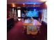 Dining room with unique fish tank and decorative chairs at 6615 New Tampa Highway, Lakeland, FL 33815