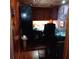 Dark wood-paneled office with ceiling lighting and coordinating cabinets at 6615 New Tampa Highway, Lakeland, FL 33815