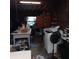 Interior storage with fan, shelving, tables, and utilitarian furnishings at 6615 New Tampa Highway, Lakeland, FL 33815