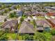 Aerial view of a neighborhood showcasing the home's location, surrounding houses, and community layout at 1111 Bassano Way, Orlando, FL 32828