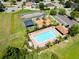 Great aerial view of pool, playground, basketball court, parking and green space at 1111 Bassano Way, Orlando, FL 32828
