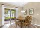 Cozy dining area with slider to outdoor patio and backyard at 1111 Bassano Way, Orlando, FL 32828