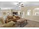 Inviting living room with archways, tile flooring, and a comfortable seating area at 1111 Bassano Way, Orlando, FL 32828