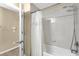 Bathroom shower and bathtub with tile surround, providing a clean and modern bathing space at 1111 Bassano Way, Orlando, FL 32828
