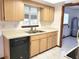Kitchen features light wood cabinets, tile floors and a stainless-steel sink at 8386 Sw 105Th Pl, Ocala, FL 34481