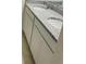 Elegant bathroom vanity with dual sinks, granite countertop, and white cabinetry at 5543 Siltstone St, Lakeland, FL 33811