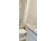 Clean bathroom with a combined tub and shower, toilet, vanity with granite countertop, and white cabinets at 5543 Siltstone St, Lakeland, FL 33811