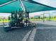 Fun-filled playground with climbing structures, slides, and swings, offering a safe and engaging space for children at 5543 Siltstone St, Lakeland, FL 33811