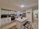 Bright open kitchen featuring stainless steel appliances, and granite countertops on island at 5790 Cherry Tree Dr, Lakeland, FL 33811