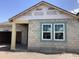 New construction home with concrete block exterior and visible framing and windows at 5722 Cattle Ranch Drive, St Cloud, FL 34771