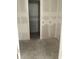 A doorway leads to another space, offering a peek into the layout of the home at 5722 Cattle Ranch Drive, St Cloud, FL 34771