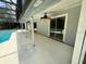 Relaxing pool with screened enclosure and well-kept deck, perfect for outdoor enjoyment at 299 Cobalt Dr, Kissimmee, FL 34758