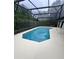 Enjoy this screened pool, featuring a pristine white deck and offering an ideal outdoor relaxation spot at 299 Cobalt Dr, Kissimmee, FL 34758