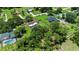 Spacious property featuring lush trees and a private backyard with a pool at 4621 Musket Dr, Lakeland, FL 33810
