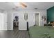 Relaxing bedroom showcases a ceiling fan, walk-in closet, and bathroom access for added convenience at 4621 Musket Dr, Lakeland, FL 33810