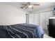 Bedroom with a ceiling fan, and closet space, creating a calm and inviting atmosphere at 4621 Musket Dr, Lakeland, FL 33810