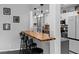 Kitchen bar with seating that separates the kitchen from the living room at 4621 Musket Dr, Lakeland, FL 33810