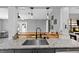 Updated kitchen with granite counters, stainless steel dishwasher, and undermount sink at 4621 Musket Dr, Lakeland, FL 33810