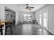 Bright living room with access to the outside and view to the kitchen area at 4621 Musket Dr, Lakeland, FL 33810
