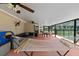 Spacious screened patio featuring a hammock and pool view, ideal for relaxation and leisure at 4621 Musket Dr, Lakeland, FL 33810