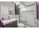 This modern bathroom features sleek fixtures, a glass-enclosed shower, and stylish tile work at 523 Club Cir, Lakeshore, FL 33854