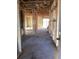 Unfinished interior showcasing bare framing and concrete floor at 5724 Haystack Drive, St Cloud, FL 34771