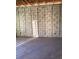 Unfinished living room featuring a concrete floor and bare walls at 5724 Haystack Drive, St Cloud, FL 34771