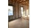 New construction room with concrete walls, wood trim and newly installed windows allowing for plenty of sunlight at 5724 Haystack Drive, St Cloud, FL 34771