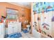 Bathroom featuring a vanity, toilet, and a shower with a beach-themed curtain at 811 Casselberry Dr, Lake Wales, FL 33853