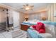 Bedroom with neutral colored walls, tile floor, and large bed at 811 Casselberry Dr, Lake Wales, FL 33853