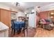Charming dining area adjacent to the kitchen with tile flooring and a cozy atmosphere at 811 Casselberry Dr, Lake Wales, FL 33853