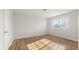 Bedroom with wood-look floors, ample natural light, and a neutral color palette at 1183 Honey Blossom Dr, Orlando, FL 32824