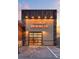 Well-lit entrance of Clermont Brewing Co. shows modern architecture and an inviting atmosphere at 1440 12Th St, Clermont, FL 34711