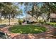 Charming historic home surrounded by lush landscaping and inviting outdoor spaces at 1440 12Th St, Clermont, FL 34711