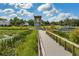 Scenic view of Waterfront Park features a tower overlooking the water and boardwalk at 1440 12Th St, Clermont, FL 34711