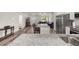 Open kitchen and living area with stainless steel appliances and an eat-in kitchen island at 231 Marion Oaks Trl, Ocala, FL 34473