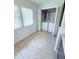 Bright laundry room with a window, washer, and dryer for convenient chores at 663 Jamaica Cir, Lakeland, FL 33803