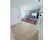 Open concept living and dining area with abundant natural light and neutral color palette at 663 Jamaica Cir, Lakeland, FL 33803