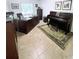Spacious office featuring a dark wood desk, piano, and ample storage space at 663 Jamaica Cir, Lakeland, FL 33803