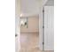 Bright bedroom features neutral walls and tile flooring at 8851 Sw 116Th Street Rd, Ocala, FL 34481