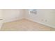 Neutral bedroom with tile flooring and lots of light at 8851 Sw 116Th Street Rd, Ocala, FL 34481