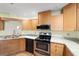 Kitchen features stainless appliances, granite countertops and plenty of cabinet space at 8851 Sw 116Th Street Rd, Ocala, FL 34481