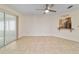 Living room boasts ceramic tile floors and a breakfast bar to the kitchen at 8851 Sw 116Th Street Rd, Ocala, FL 34481