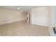 Spacious living area with tile flooring and bright, neutral paint at 8851 Sw 116Th Street Rd, Ocala, FL 34481