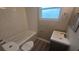 Updated bathroom featuring subway tile, new fixtures, and a modern vanity at 1514 Crest Ave, Leesburg, FL 34748