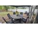 Cozy outdoor seating area with a table and chairs in a private backyard at 528 Winding Oak Ln, Longwood, FL 32750