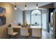 Bright breakfast nook with a glass table and ample natural light from bay windows at 528 Winding Oak Ln, Longwood, FL 32750