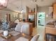 Modern kitchen with stainless steel appliances and a convenient breakfast bar overlooking the living area at 2509 Montecito Ave, Eustis, FL 32726